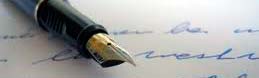 pluma sobre un escrito